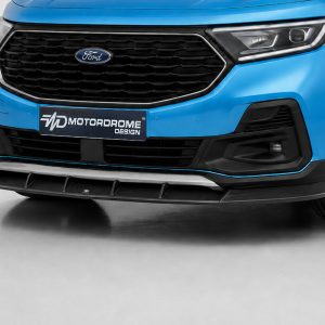 Blue Ford front view featuring a black honeycomb grille, right headlight, and a Motoradome Design license plate area.