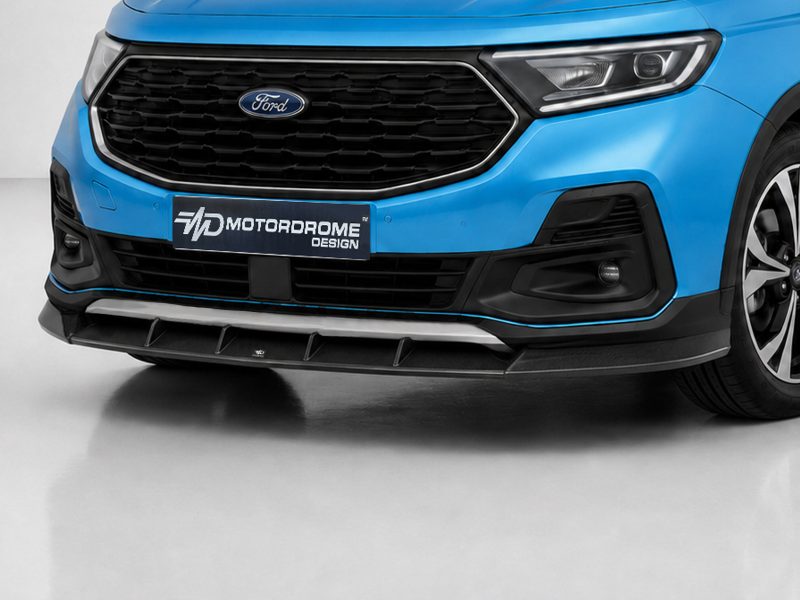 Blue Ford front view featuring a black honeycomb grille, right headlight, and a Motoradome Design license plate area.