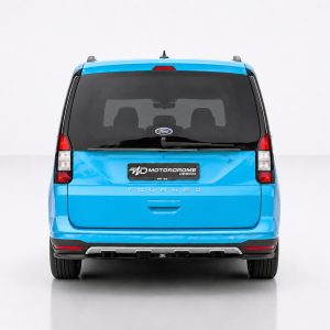 K205-003_2jpg - OPSHOLDERS Rear view of a bright blue Ford Tourneo minivan in a studio, showing the Motordrome Design plate on the tailgate.