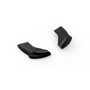 Two black glossy curved fragments lying on a white background, separated apart.