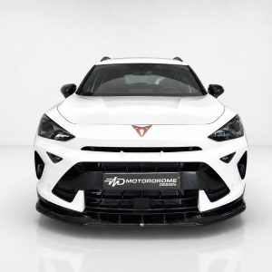 Front view of a white sports car with black grille and red emblem on the hood, 'Motordrome Design' logo on the front plate.