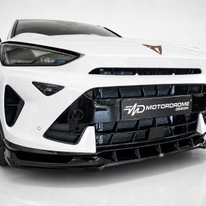 Front view of a white sports car with black grille and Motordrome Design plate in the center.ensuring a concise studio shot context.