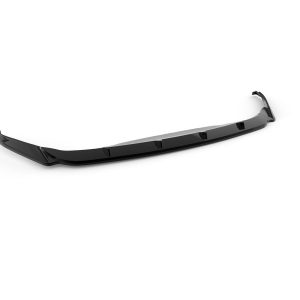 Long glossy black car front splitter or aero lip with integrated fins, designed to improve aerodynamics and downforce.