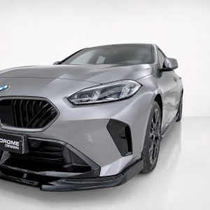Front-left three-quarter view of a silver BMW in a white studio setting.