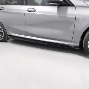 K215-004_3jpg - OPSHOLDERS Side view of a silver BMW showing the lower door, side skirt, and alloy wheel with M badge on the front fender.