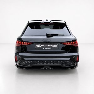 Rear view of a black Audi SUV in a white studio, with red LED taillights and a Motordome Design license plate.