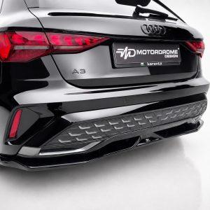 K216-005_3jpg - OPSHOLDERS Rear view of a glossy black Audi A3, showing distinctive taillights and a Motordrome Design plate on the trunk