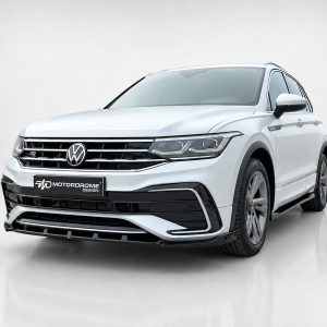 K218-001_2jpg - OPSHOLDERS Front three-quarter view of a white VW SUV with chrome grille and black lower bumper, displaying a Motordrome Design plate on the front bumper.