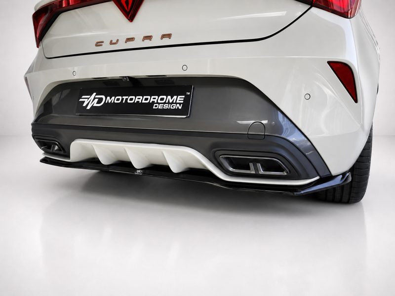 Rear view of a white CUPRA hatchback with a black 'Motordrome Design' plate and sporty rear diffuser.