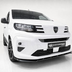White Peugeot van with custom Motordrome Design plate, front angled view in a clean studio setting