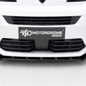 Front view of a white car with large black grille and a Motordrome Design plate in the center plate area