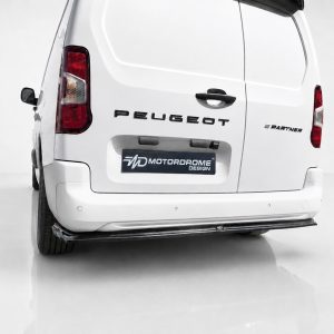 Rear view of a white Peugeot Partner van showing the Peugeot badge and 'E Partner' lettering on the back door, with a Morodrome Design plate.