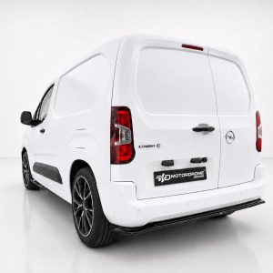 White cargo van shown from a rear three-quarter view with closed rear doors and 'Combo' badge visible on the left rear corner of the vehicle