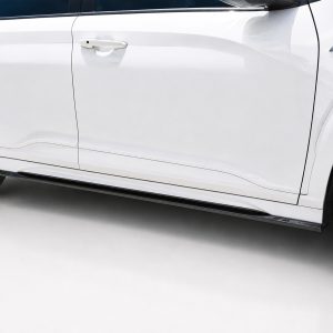 White car side panel with two doors, chrome door handles, and a visible N Line badge near the front wheel well