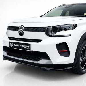Front three-quarter view of a white SUV with a black grille and Citroën emblem on the hooded badge