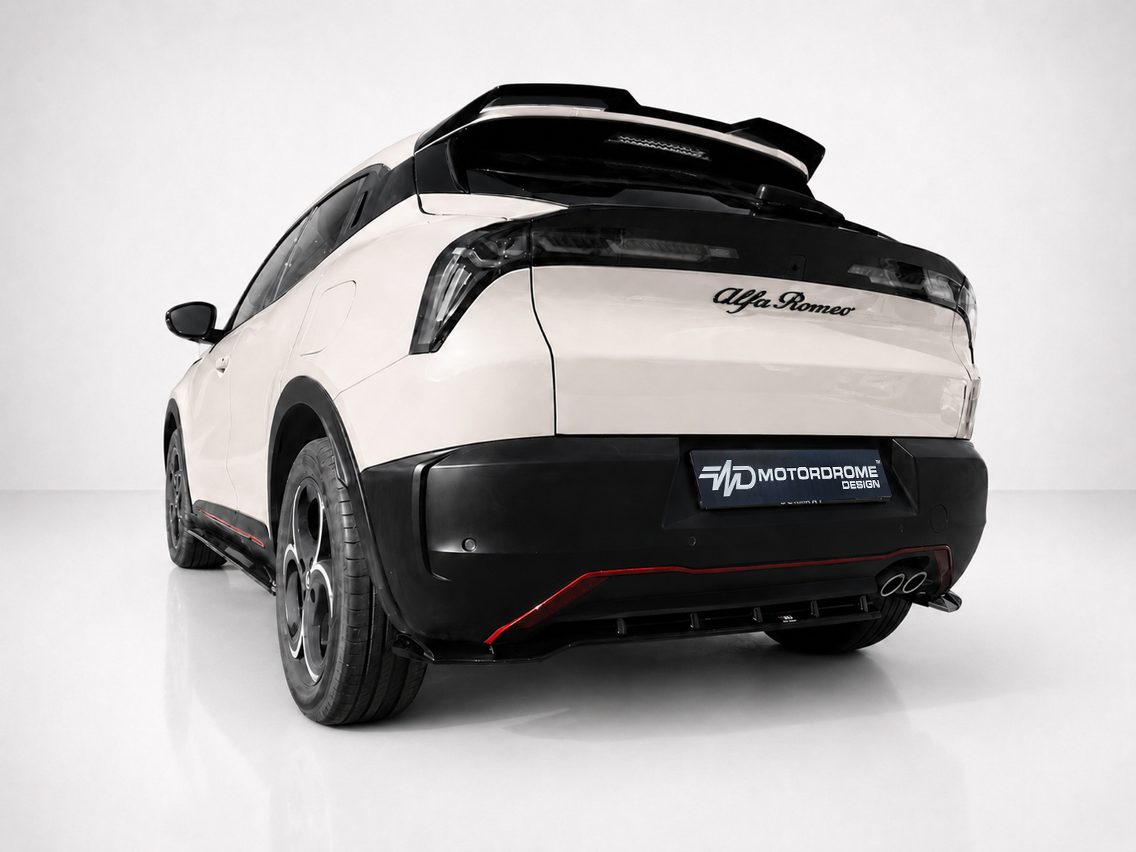 K227-003_2jpg - OPSHOLDERS Rear three-quarter view of a white Alfa Romeo SUV with black trim, spoiler, and red accent on the bumper