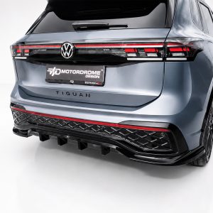 K228-003_4jpg - OPSHOLDERS Rear view of a silver Volkswagen Tiguan with prominent LED taillights and a MotorDrome Design plate
