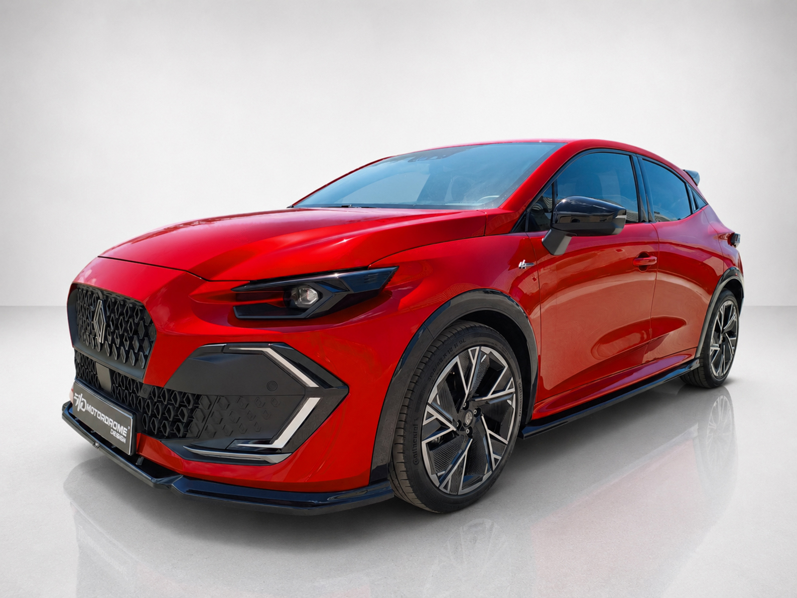 K233-002_1jpg - OPSHOLDERS Red sporty hatchback from a front-left angle, showcasing a bold black honeycomb grille and sharp headlights in a studio setting.
