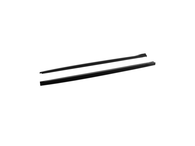 K233-002_7jpg - OPSHOLDERS Two black windshield wiper blades lying diagonally on a white background (elongated, flat blades).