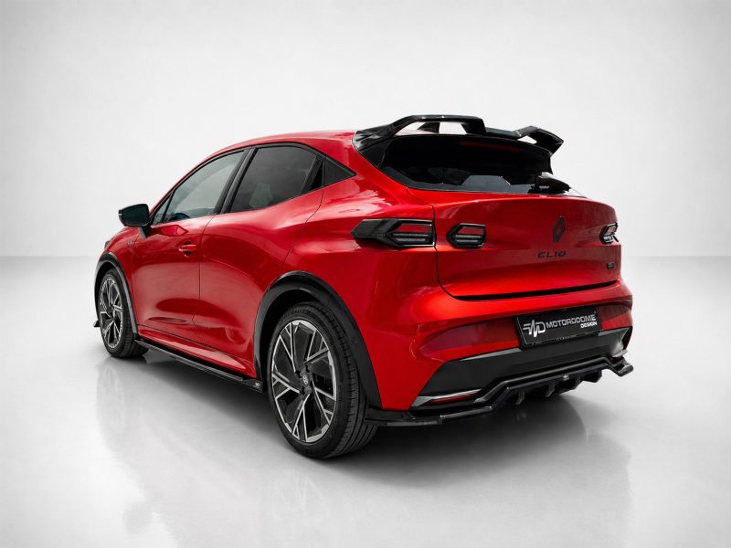 Red Renault Clio hatchback, photographed from the rear-left, with a sporty spoiler and large alloy wheels.