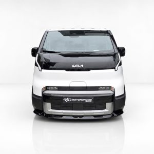 Front view of a two-tone van with a Kia logo and a MotorDrome Design plate in a white studio setting, glossy black hood.