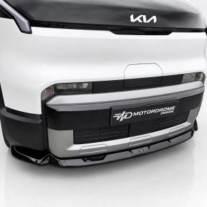 Front view of a white truck with a black upper hood and custom lower bumper, logo visible on the hood (Kia).