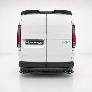 Rear view of a white cargo van with split rear doors, black bumper, and vertical red taillights; Motordrome Design badge visible on the left door.
