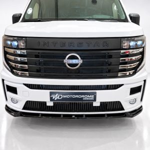 Front view of a white Nissan Interstar van with a bold black grille and emblem visible on the nose.