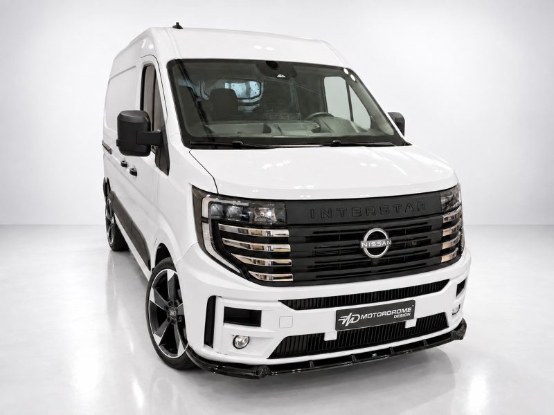 White Nissan Interstar van shown from a front-left angle in a bright studio setting .
