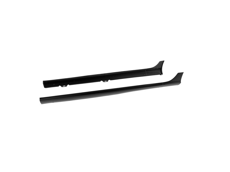 Two black car side skirts laid out on a white background, exterior body kit components for a vehicle