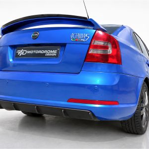 K43-008_2jpg - OPSHOLDERS Blue Skoda Octavia vRS rear view with a large rear spoiler and black Motordrome Design plate on a clean studio backdrop.