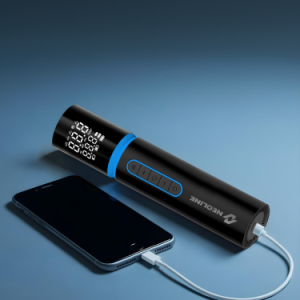 Black cylindrical power bank with a blue ring and LED display, charging a smartphone via a white cable on a blue surface.