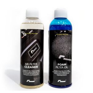 Two RacingLine bottles with white caps on a white background: left bottle contains Air Filter Cleaner, right bottle contains Foam Filter Oil (blue liquid).