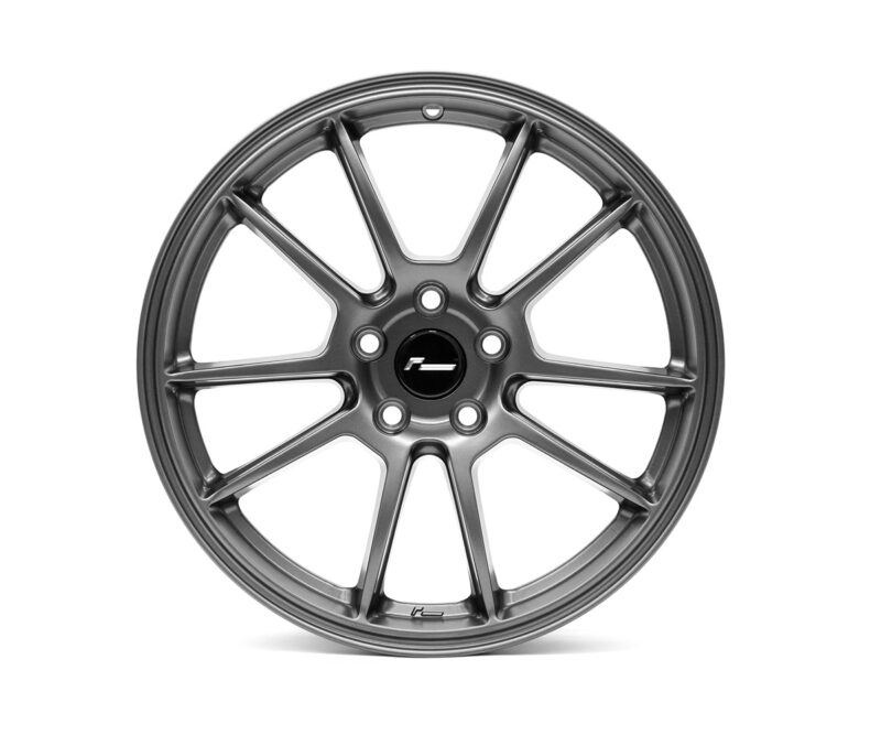 Gray ten-spoke alloy car wheel with a black center cap and printed logo, isolated on white background.