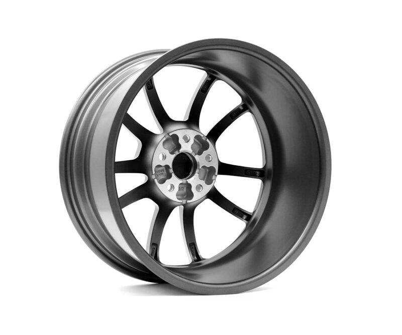 Alloy car wheel rim with multiple black spokes and a silver center hub, shown at an angle against a white background.