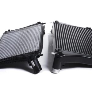 Racingline-MQB-Intercooler-6-1jpg - OPSHOLDERS Two automotive radiators placed side by side on a white background, showing metal fins and plastic end tanks.
