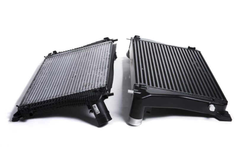 Racingline-MQB-Intercooler-6-1jpg - OPSHOLDERS Two automotive radiators placed side by side on a white background, showing metal fins and plastic end tanks.
