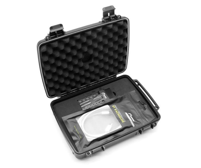 Racingline-PDM-Home-Tuning-VWR031000_2-1jpg - OPSHOLDERS Open hard protective case with egg-crate foam lining, showing a small toolkit and a packaged cable inside the molded foam pocket.