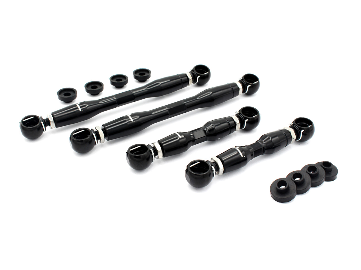 Racingline-VWR436001-1jpg - OPSHOLDERS Four black bicycle handlebar ends with silver clamps and accompanying rubber spacers on a white background.