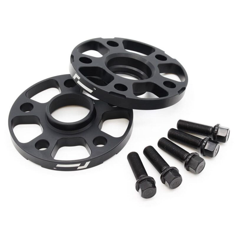 Spacers1-1jpg - OPSHOLDERS Pair of black wheel spacers with evenly spaced cutouts and accompanying bolts, likely bike wheel hub spacers and fasteners set