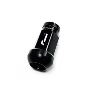 Close-up of a small black cylindrical tool with a knurled cap and white label on a white background.