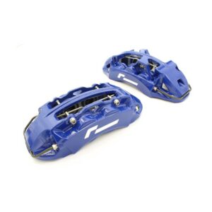 Pair of blue bicycle brake calipers with white logo on a white background.