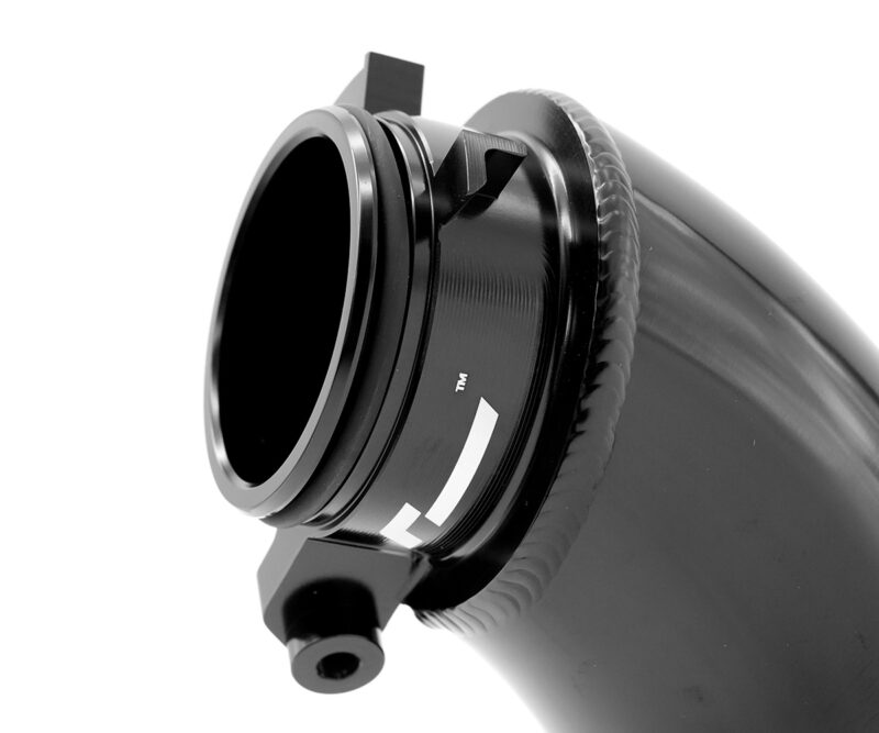 VWR120005_2jpg - OPSHOLDERS Close-up of a black telescope eyepiece adapter attached to a cylindrical tube, showing a knurled ring and mounting hardware