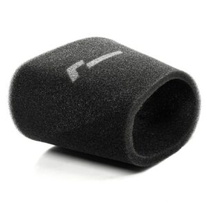 Close-up of a black textured foam roller lying on its side against a white background.