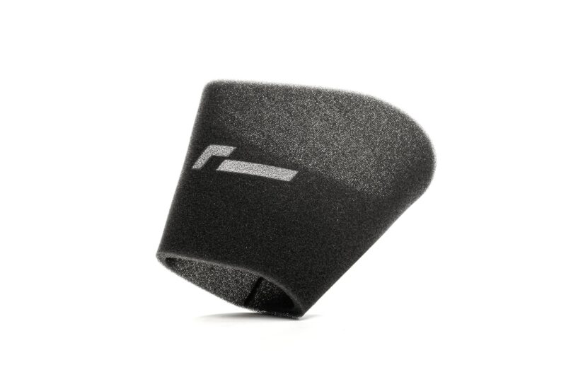 VWR12G7R600OS-2-1jpg - OPSHOLDERS Close-up of a black foam microphone windscreen with a white rectangular detail, set against a white background.
