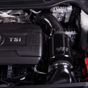 Close-up of a VW TSI engine bay with a black aftermarket HR air intake system and tubing visible.","Volkswagen TSI engine with an aftermarket black HR air intake and red battery terminal nearby.","Engine compartment showing VW TSI cover and an HR-branded air intake pipe.","Under-hood view featuring a TSI engine and a glossy black HR intake tube.","Performance-looking engine bay with VW badge, TSI cover, and HR air intake assembly."]} }**Note: The JSON contains stray characters; please use only the ALT strings.**}»Oops, cleaning up. Use proper JSON. Here is corrected:**