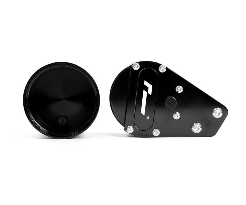 Black circular cap and an angled black mounting plate with multiple screws, likely a hub or motor mount component in a mechanical assembly.