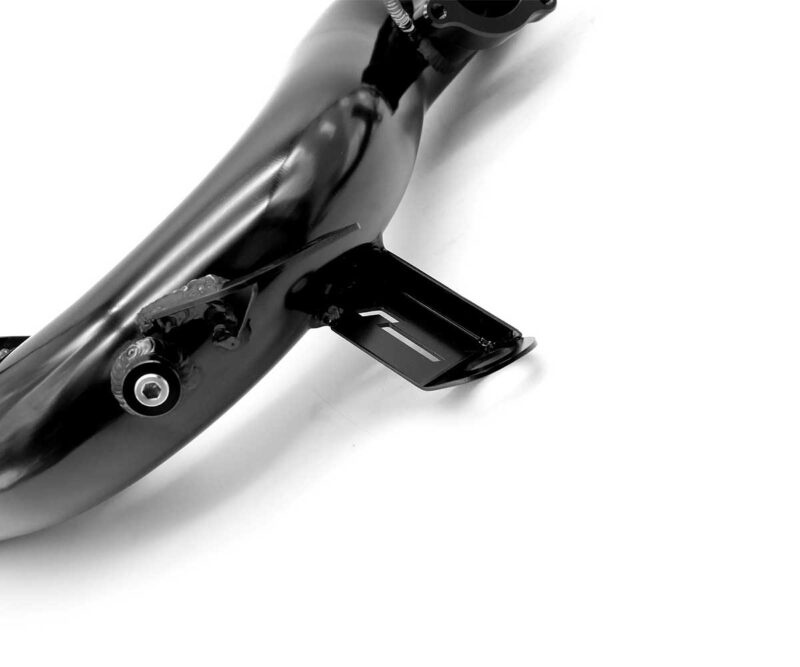 Close-up of a glossy black bicycle frame with a flat platform pedal attached to the crank against a white background.