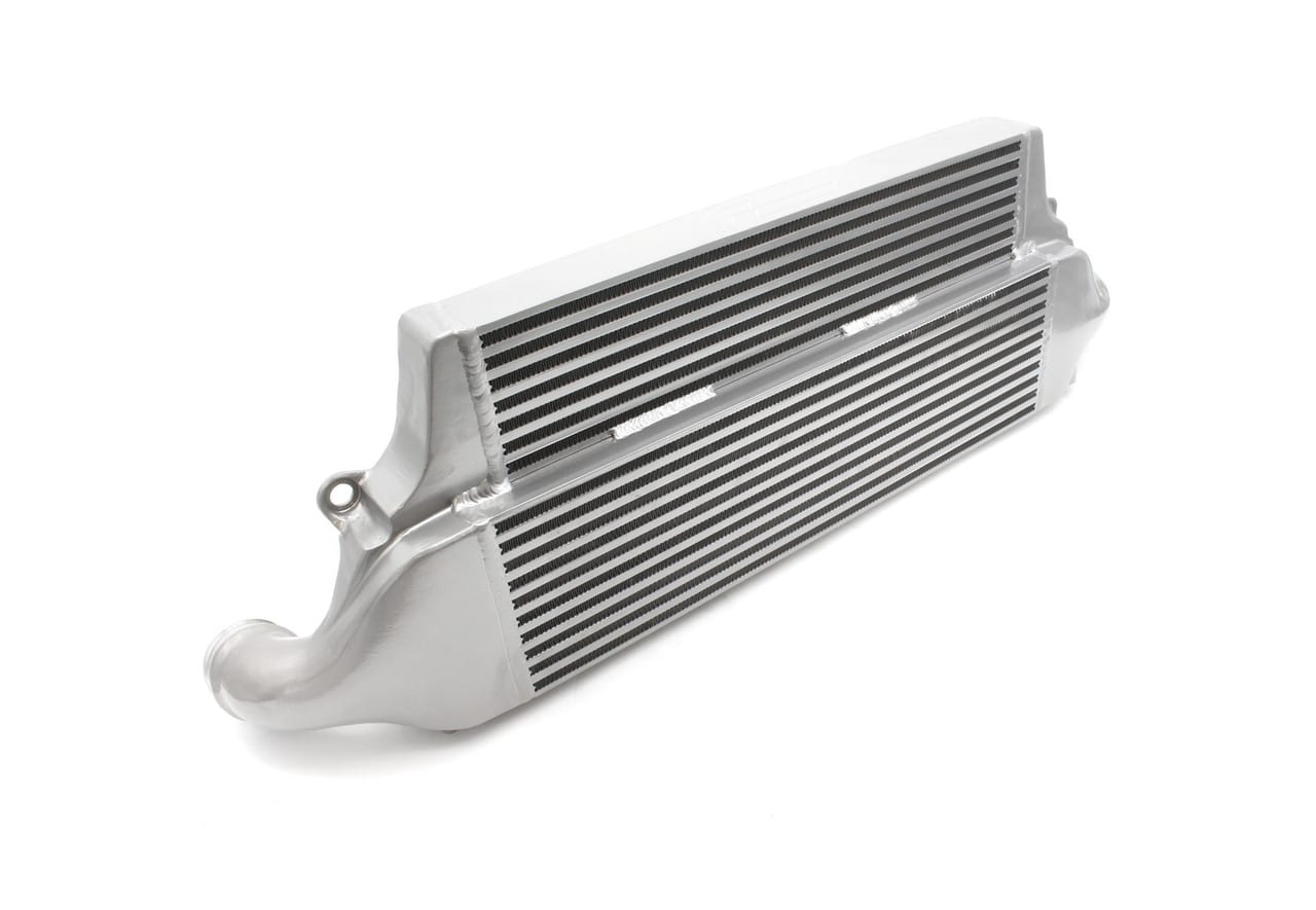 VWR143000-1jpg - OPSHOLDERS Aluminum automotive intercooler core with fins and end tanks, used in a turbocharged engine on a white background’s surface