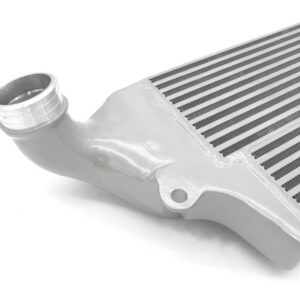 VWR143000_5-1jpg - OPSHOLDERS Aluminum intercooler core with curved pipe fitting and fins, close-up view.